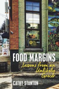 Book cover showing the side of a brick building, title Food Margins: Lessons from an Unlikely Grocer